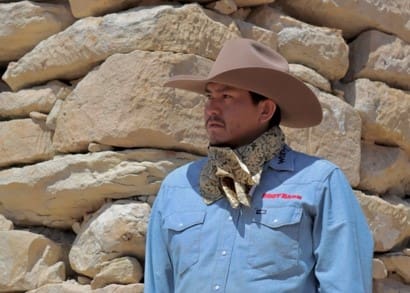 A man wearing a cowboy hat